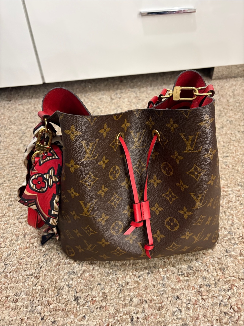 Louis Vuitton Monogram Canvas Bucket Bag with Red Trim